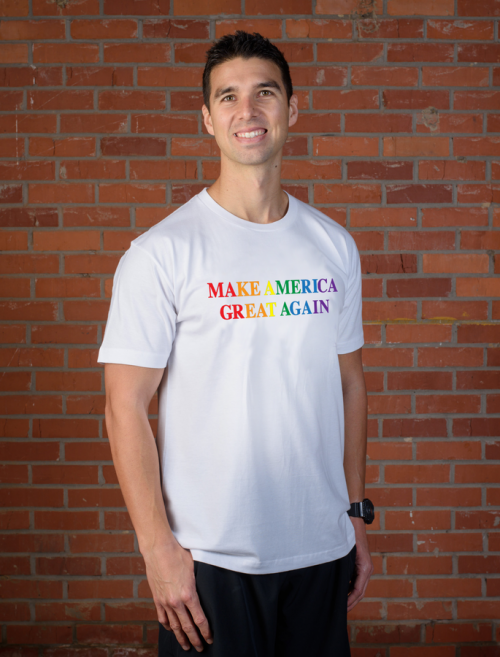 The Trump Pride T-shirt on a model with a weird smile, like he knows he's going to be famous in LGBTQ media for this