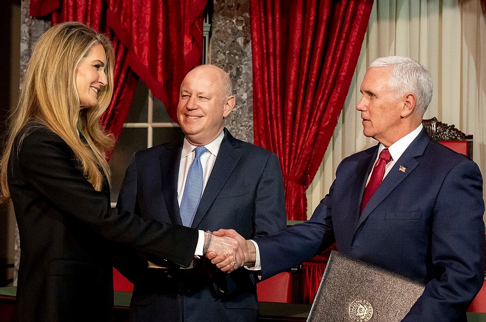 Kelly Loeffler being sworn in by Mike Pence