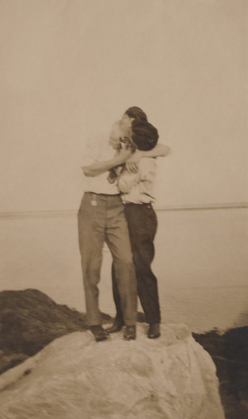 Two men kiss on Labor Day 1910