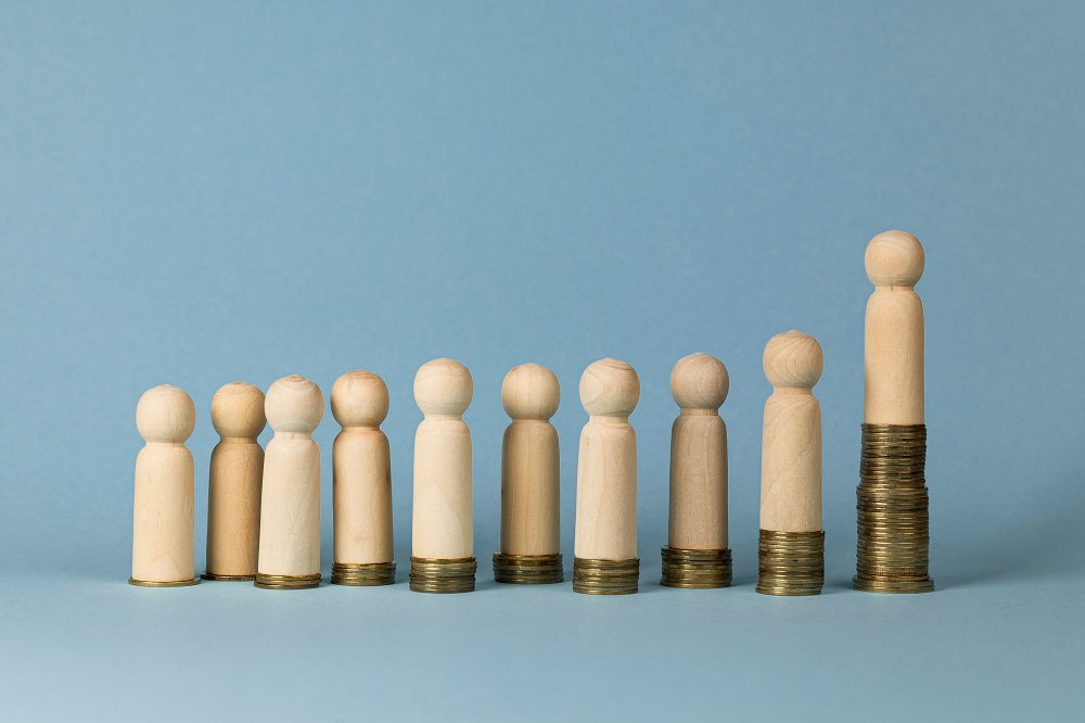 Inequality represented as coins.