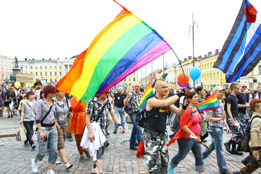 Unidentified people take part in the annual Helsinki Pride gay parade in Helsinki, Finland on June 30, 2012.