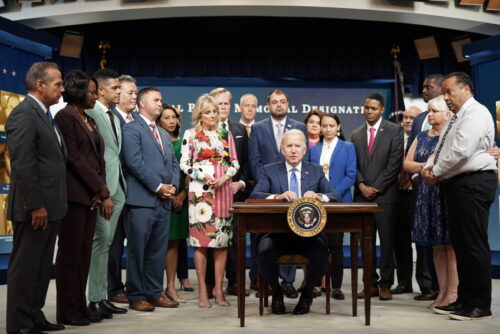 President Joe Biden preparing to sign H.R. 49, declaring the Pulse Nightclub as a national monument in front of congressional LGBTQ Equality Caucus members and LGBTQ community advocates, in the South Court Auditorium on June 25, 2021.