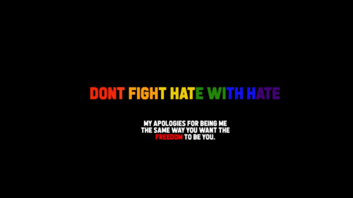 "Don't fight hate with hate" in rainbow letters