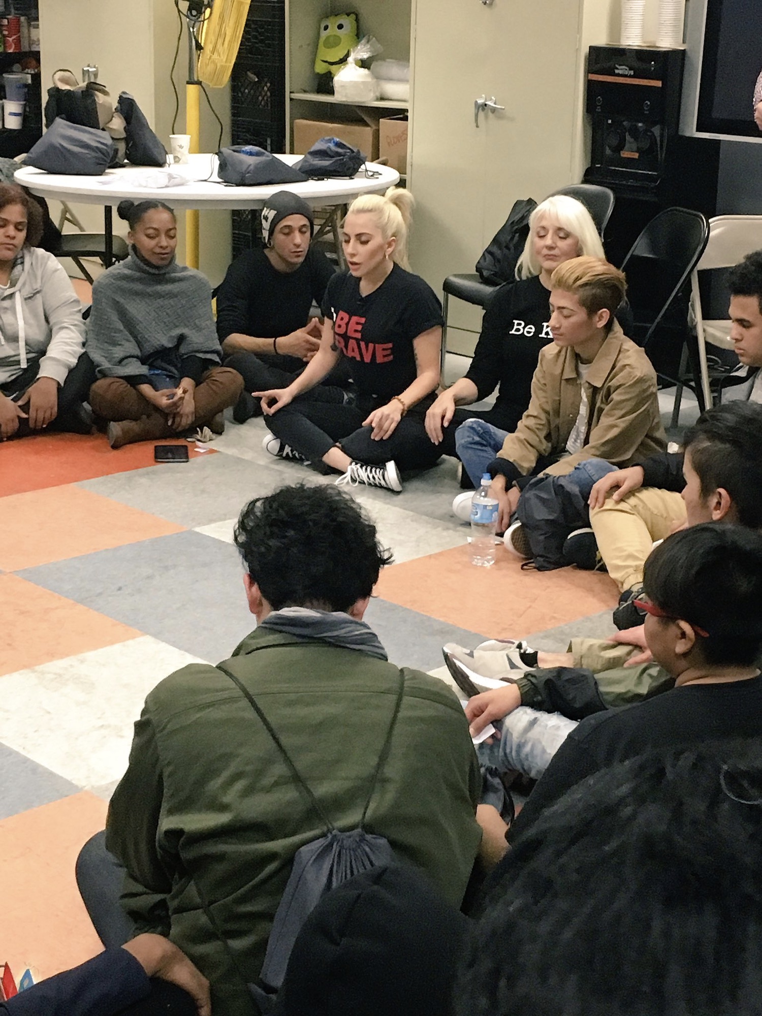 Lady Gaga leads a meditation session at the Ali Forney Center in Brooklyn in 2016. Photo courtesy of AFC