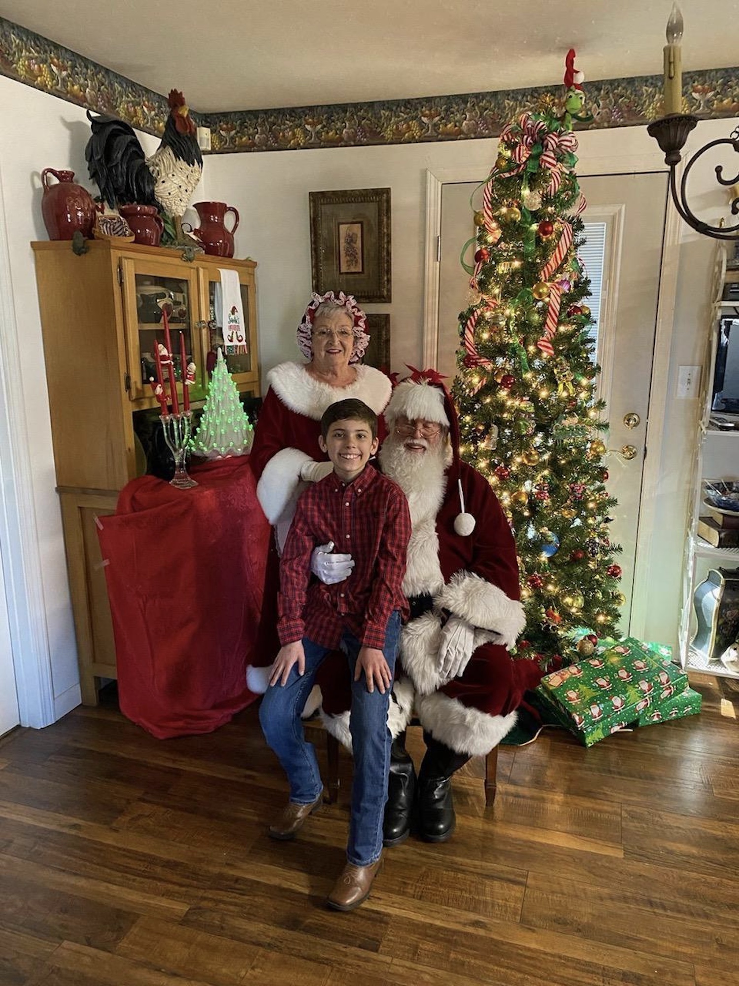 Brayden with his grandparents, Granny and Gramps Glassco, in costume for Christmas. Photo courtesy of the Glassco family