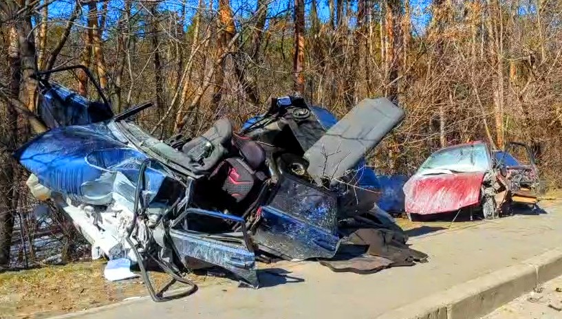 3/18/22: The mangled remains of two cars on a Kharkiv roadside.