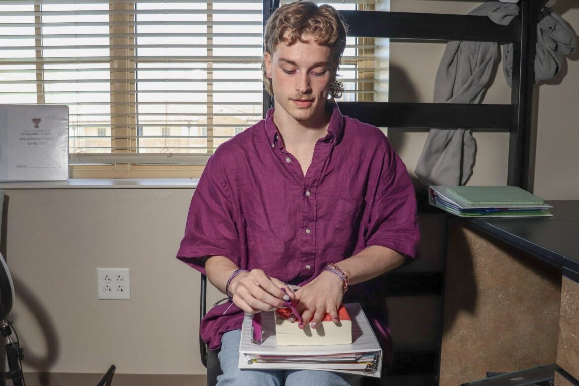 Trevor Wilkinson in his dorm room at the Texas Tech Honors Hall. Photo by Topher Covarrubio for LGBTQ Nation