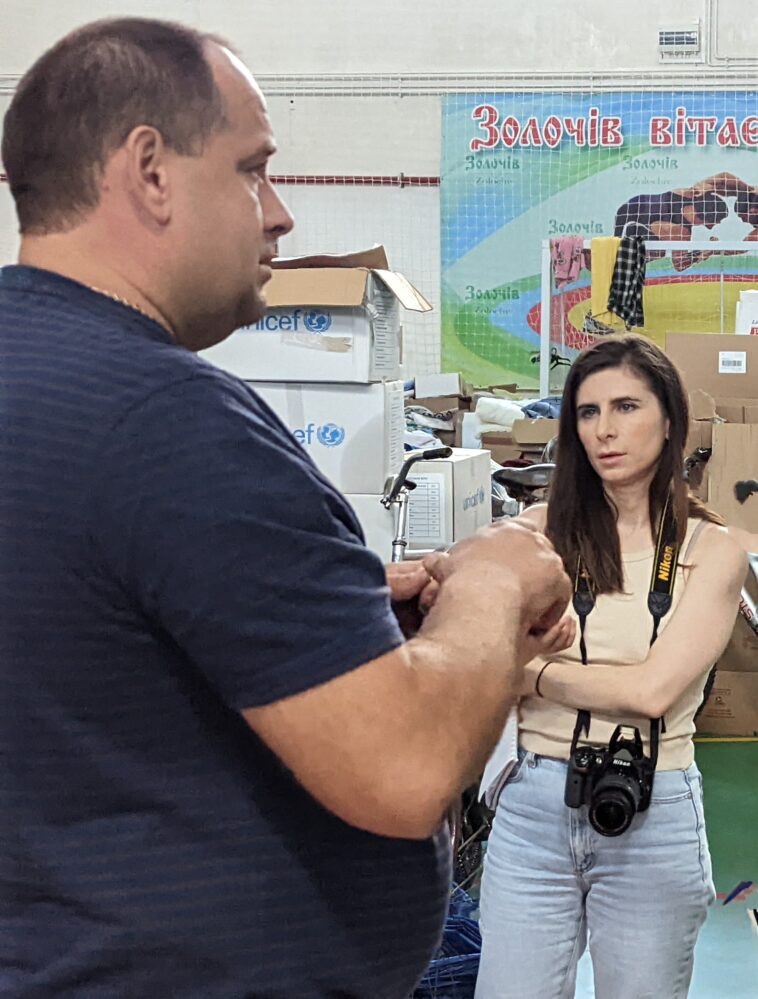 Natalie Vikhrov, interviews Sergy, who runs the Humanitarian Aid center in Zolochiv.