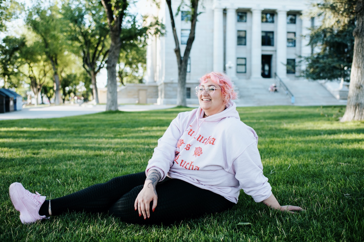 Silvia Ximi on the lawn in front of the Yavapai County Courthouse in Prescot, Arizona. Photo by Parker Micheaels Photography for LGBTQ Nation