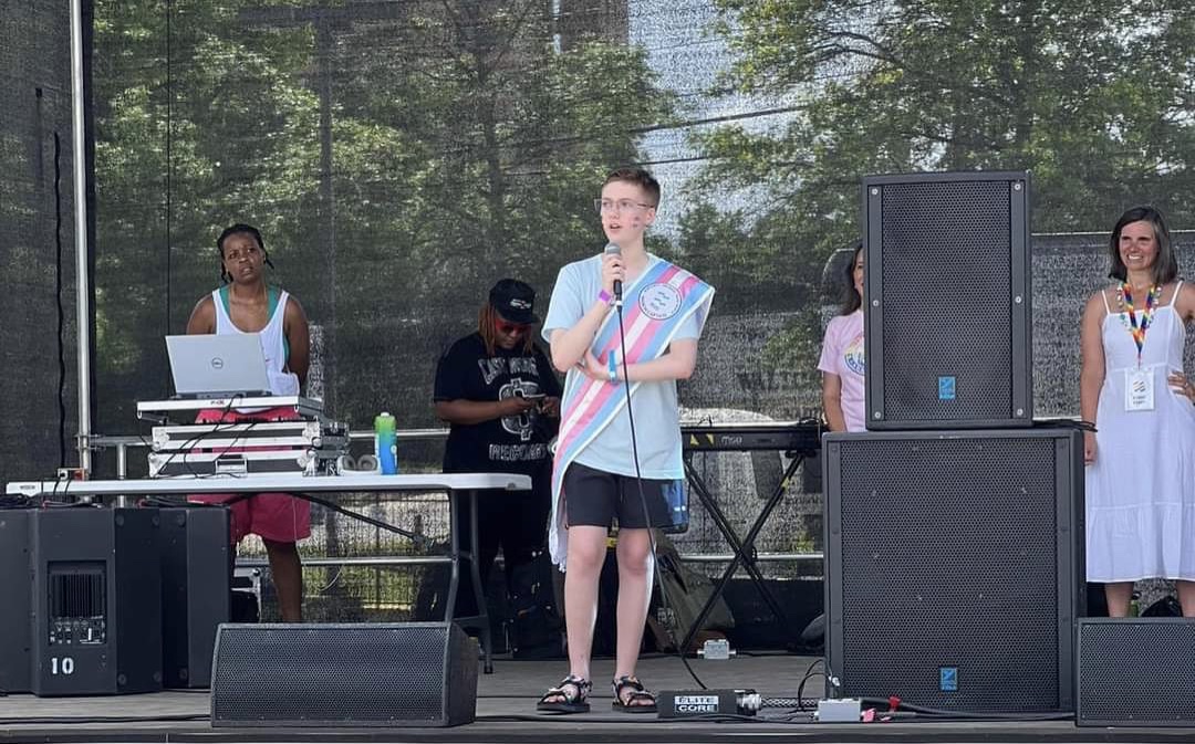 Phoenix May speaks at the Northwest Arkansas Pride Trans March Rally in Fayetteville, Arkansas, on June 18, 2022. Photo by Danielle May