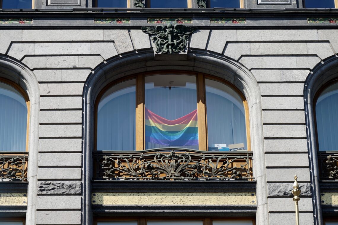 August 2, 2018: Pride flag at a window in Russian city St Petersburg