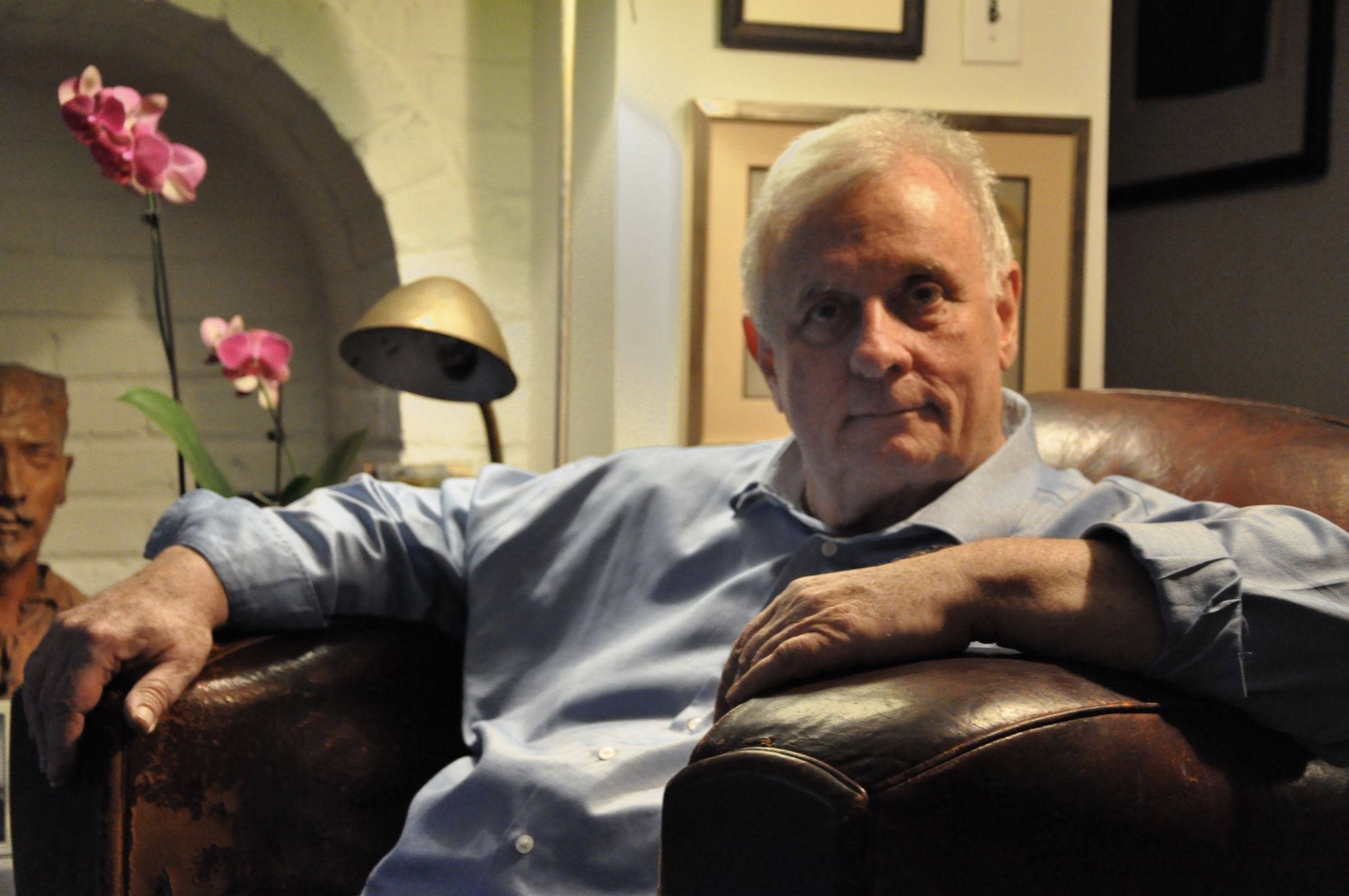 Edmund White at home in his New York City apartment. Photo courtesy of Bloomsbury.