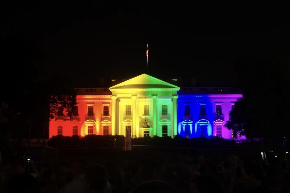 The White House bathed in rainbow colors in June 2015. In 1991, Terence Alan Smith campaigned on a pledge to paint the White House pink. (Shutterstock)